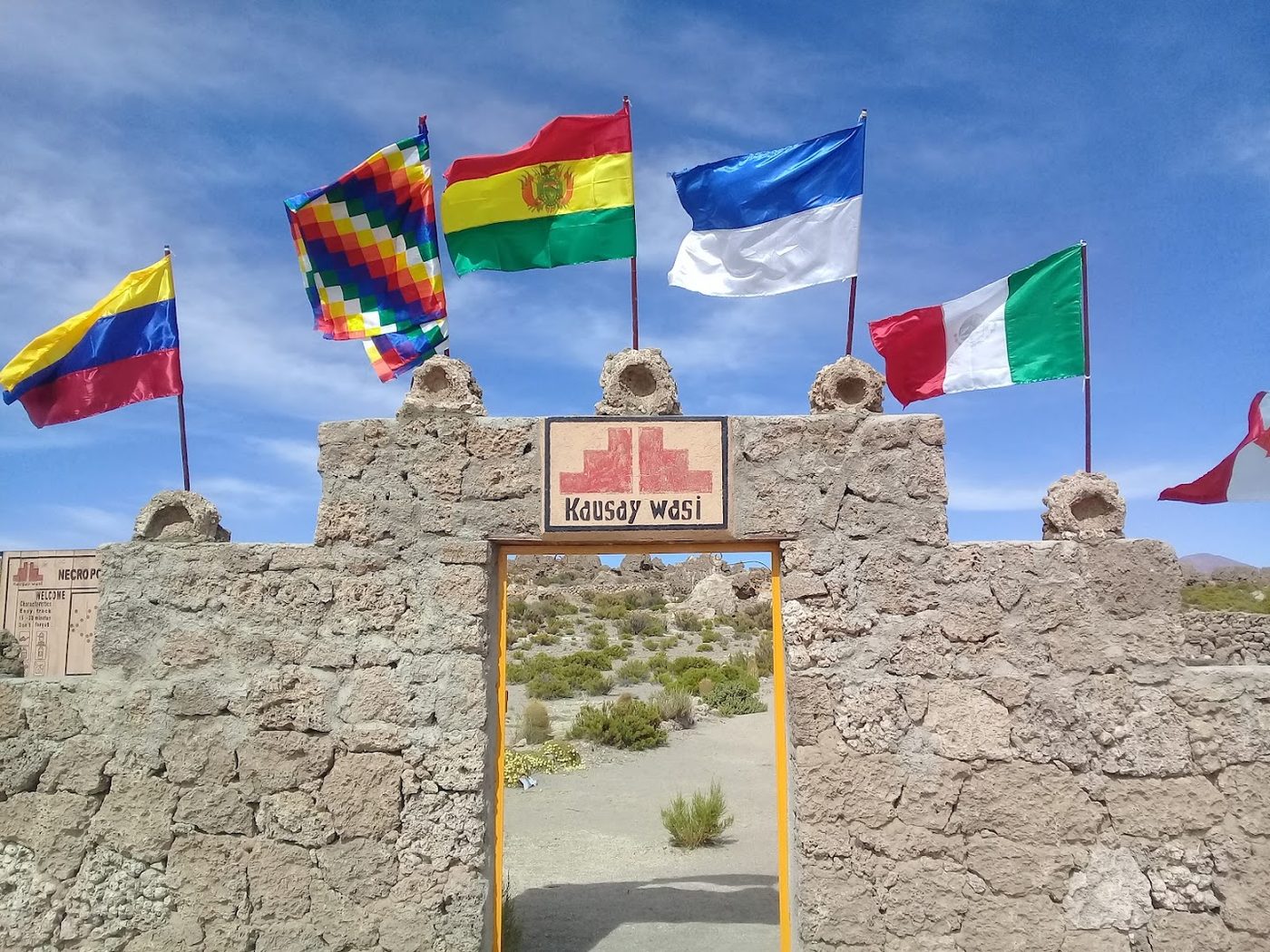 Entrance gate with Bolivian and Wiphala flags
